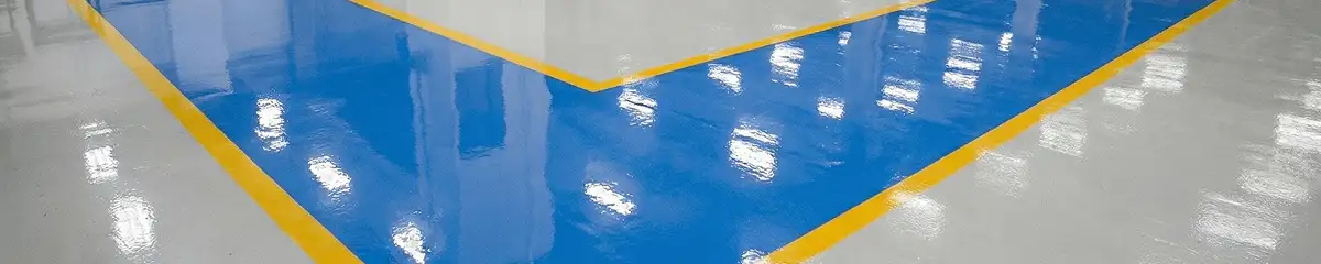 A factory floor professionally covered and marked with epoxy flooring in Scottsdale, AZ