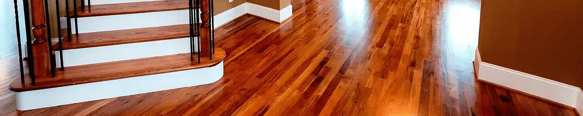 Base floor of a staircase with professionally restored wood flooring in Scottsdale AZ