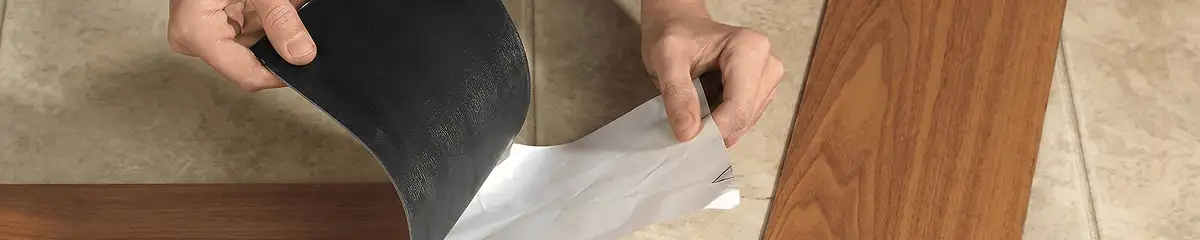 A professional installing vinyl flooring in Scottsdale, AZ
